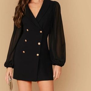 Mini blazer dress with see through sleeves.